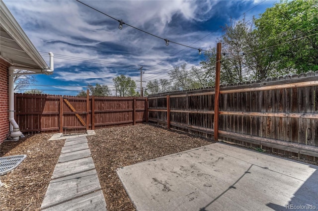 1906 S Vrain St, Denver, CO 80219 - fenced backyard with a patio