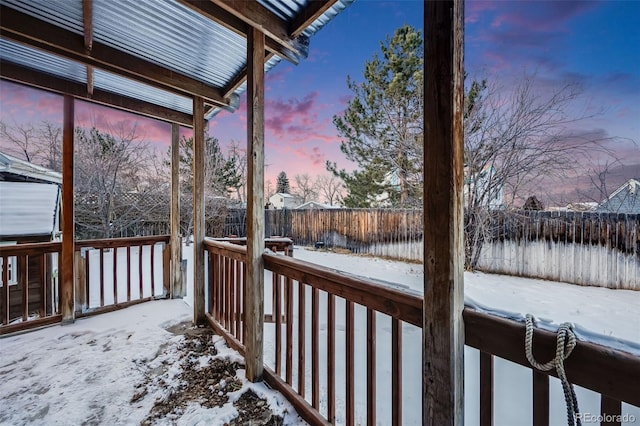 view of snow covered deck