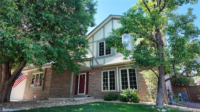 16639 E Berry Ln, Centennial, CO 80015 - tudor home with brick siding and stucco siding