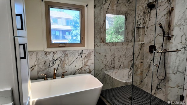 16639 E Berry Ln, Centennial, CO 80015 - full bathroom with a freestanding tub, a marble finish shower, and healthy amount of natural light