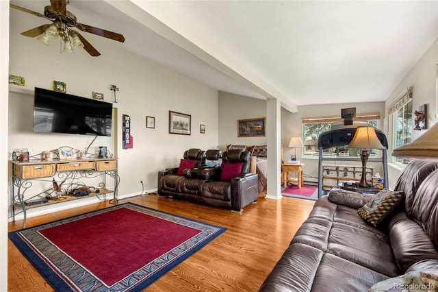 1851 E 138th Ave, Brighton, CO 80602 - living room featuring wood finished floors, ceiling fan, a baseboard radiator, and baseboards