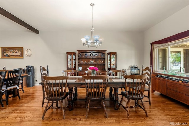 1851 E 138th Ave, Brighton, CO 80602 - dining space featuring a chandelier and wood finished floors