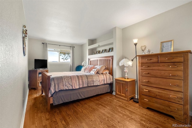 1851 E 138th Ave, Brighton, CO 80602 - bedroom with wood finished floors