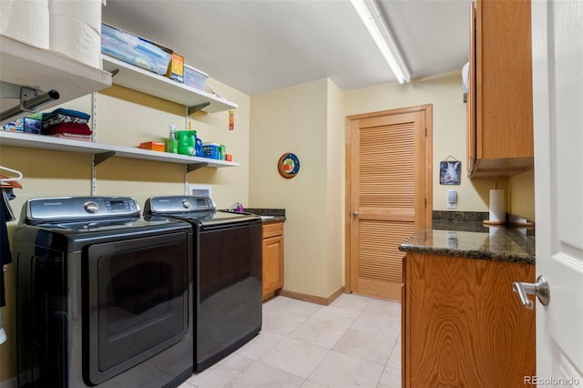 1851 E 138th Ave, Brighton, CO 80602 - washroom with washer and dryer, cabinet space, and light tile patterned flooring