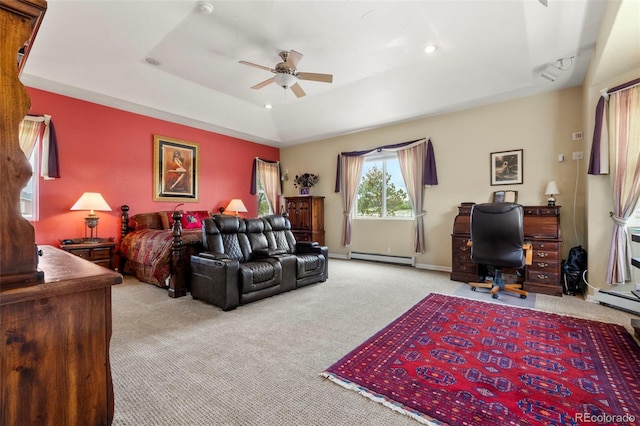1851 E 138th Ave, Brighton, CO 80602 - carpeted bedroom with baseboard heating, a tray ceiling, a desk, recessed lighting, and ceiling fan