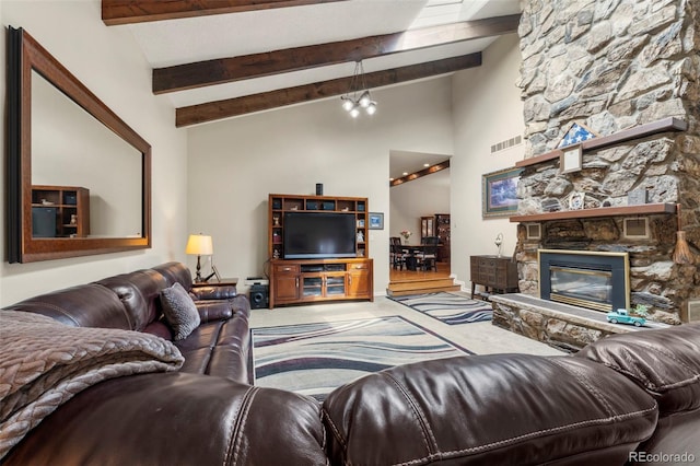 1851 E 138th Ave, Brighton, CO 80602 - living room featuring beamed ceiling, a fireplace, and high vaulted ceiling