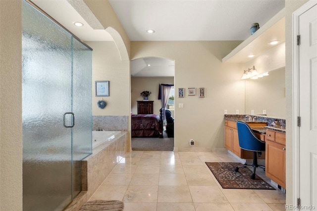 1851 E 138th Ave, Brighton, CO 80602 - ensuite bathroom with vanity, a bath, a shower stall, tile patterned floors, and recessed lighting