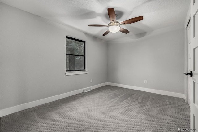 11861 E Yale Ct, Aurora, CO 80014 - spare room with a ceiling fan, carpet, and a textured ceiling