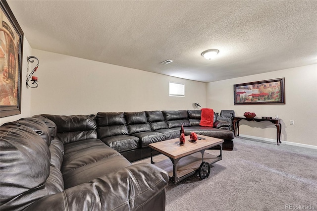 carpeted living room with a textured ceiling