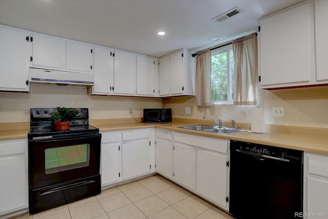 562 W Crestline Cir Unit 7D, Littleton, CO 80120 - kitchen featuring black appliances, under cabinet range hood, light tile patterned floors, light countertops, and recessed lighting