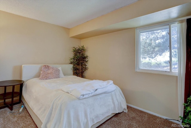 562 W Crestline Cir Unit 7D, Littleton, CO 80120 - carpeted bedroom featuring baseboards