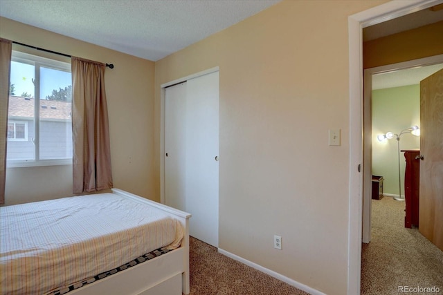 562 W Crestline Cir Unit 7D, Littleton, CO 80120 - carpeted bedroom with a closet and baseboards