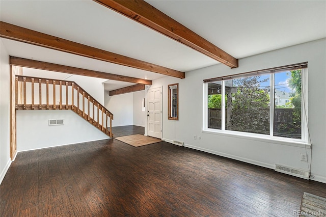 1233 S Yosemite Way Unit 74, Denver, CO 80247 - unfurnished living room with stairs, wood finished floors, and beamed ceiling