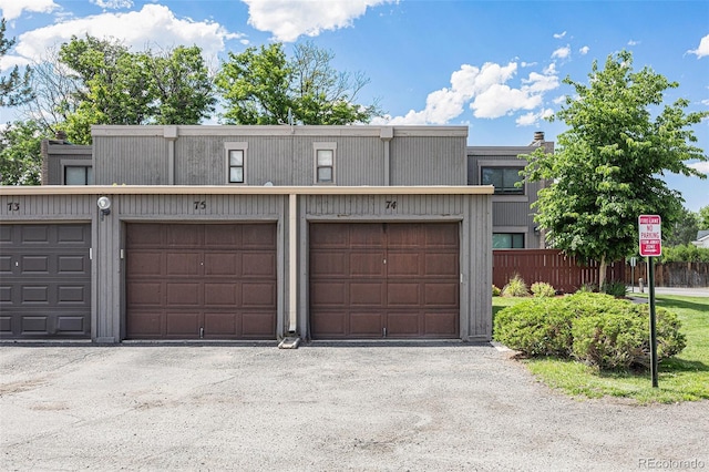 1233 S Yosemite Way Unit 74, Denver, CO 80247 - view of front of house with community garages