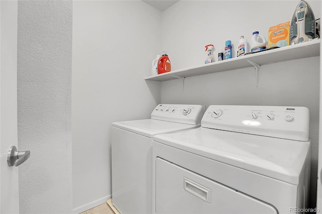 laundry area with washer and clothes dryer