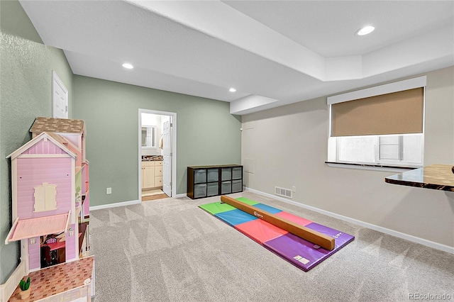 rec room featuring carpet, visible vents, baseboards, and recessed lighting