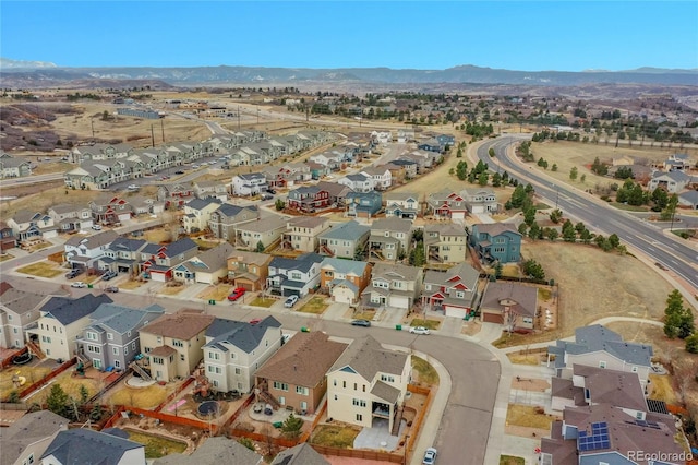 bird's eye view with a residential view and a mountain view