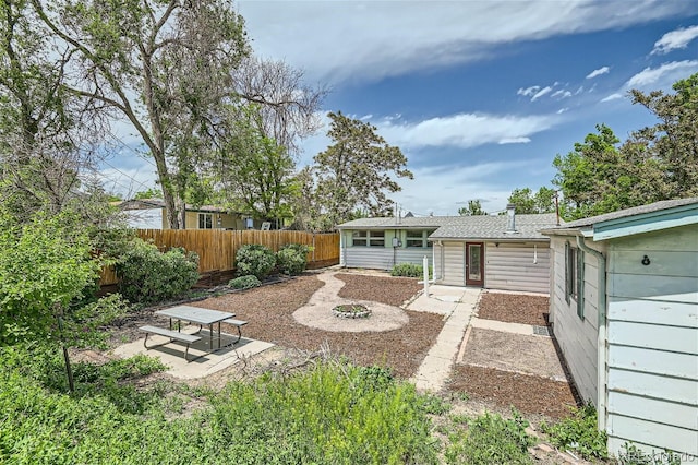 rear view of property with a patio