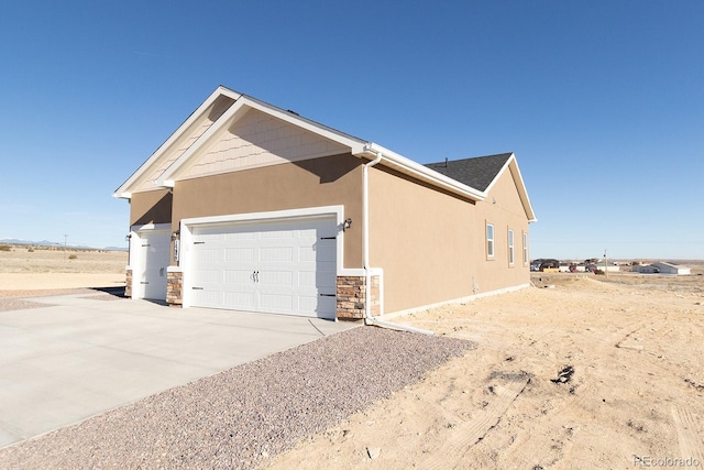 view of property exterior featuring a garage