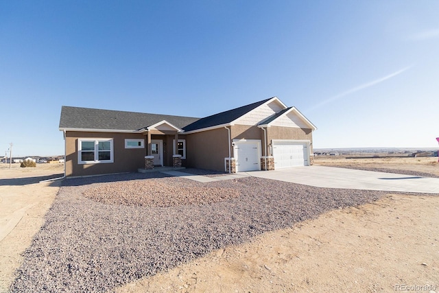 ranch-style home with a garage