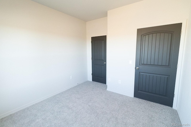 spare room featuring carpet flooring