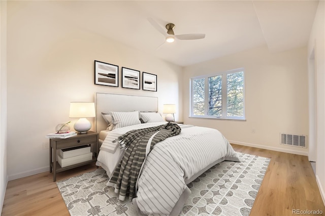 bedroom featuring hardwood / wood-style flooring and ceiling fan