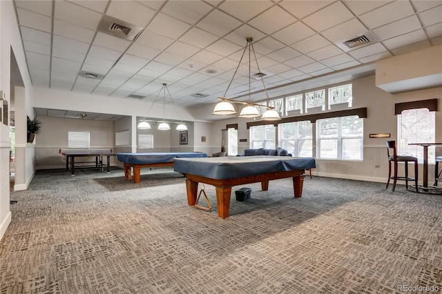 game room with a paneled ceiling, carpet floors, and pool table