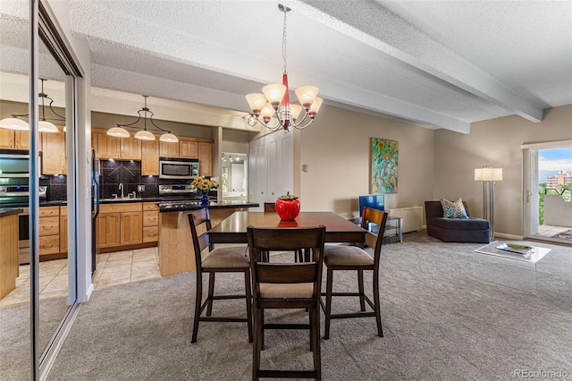 dining room with light carpet, a notable chandelier, a textured ceiling, and beam ceiling