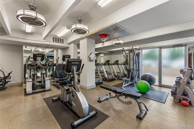 workout area with baseboards and visible vents