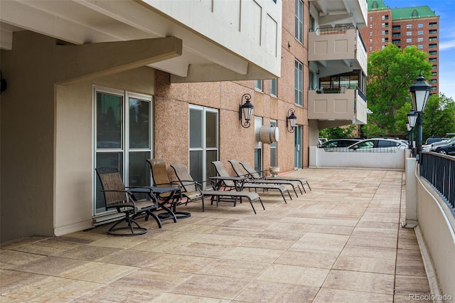 view of patio / terrace featuring a balcony