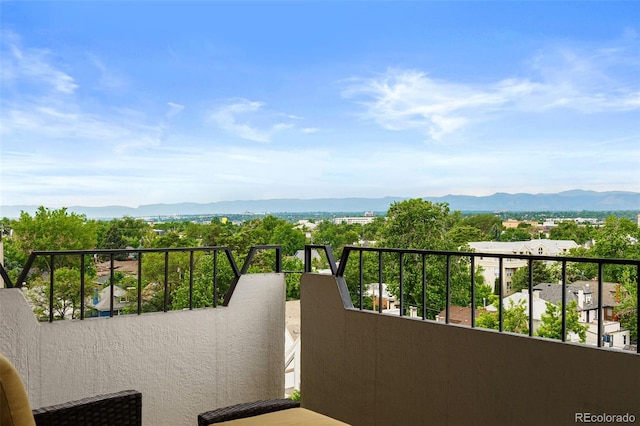 balcony featuring a mountain view