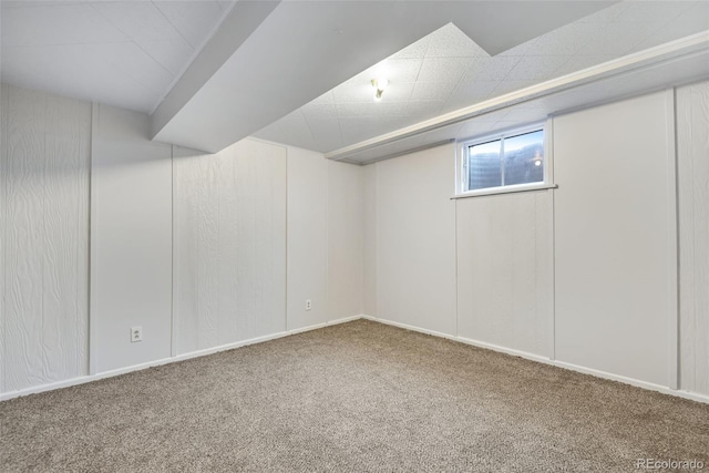 basement featuring carpet flooring