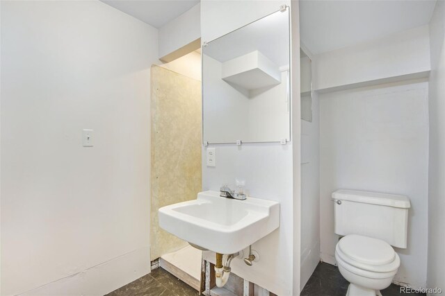 bathroom featuring toilet