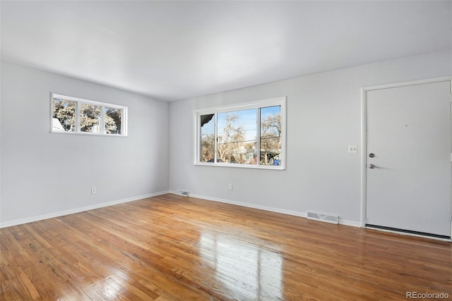 empty room featuring light hardwood / wood-style floors