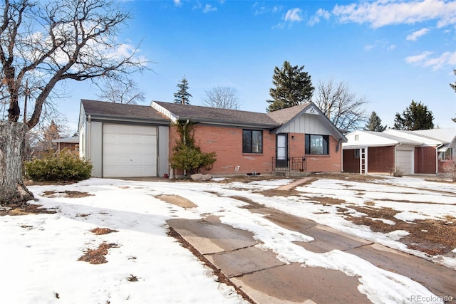 ranch-style house with brick siding and a garage