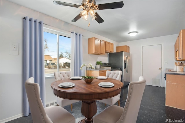 dining room with ceiling fan