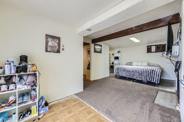 bedroom with a textured ceiling