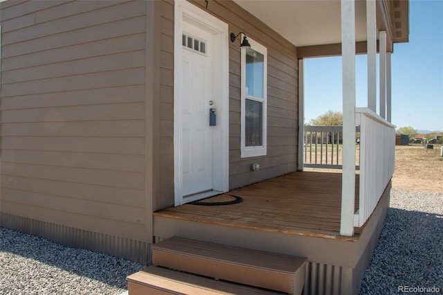 entrance to property with a porch