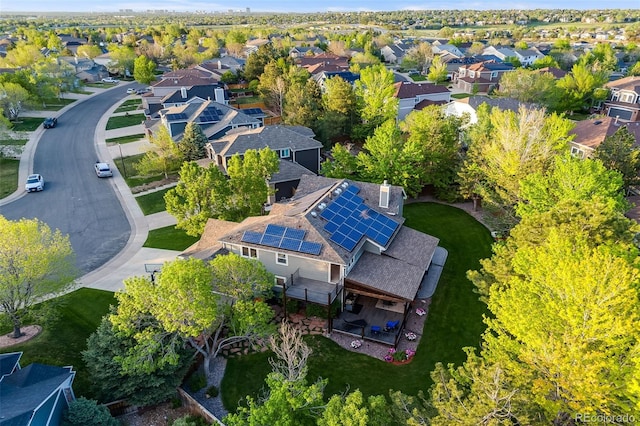 aerial view of property's location featuring nearby suburban area