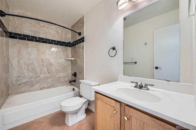 full bath featuring bathtub / shower combination, vanity, toilet, and tile patterned floors