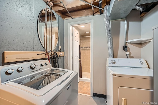 washroom with separate washer and dryer