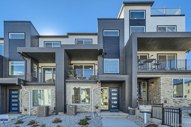 view of front of property featuring cooling unit