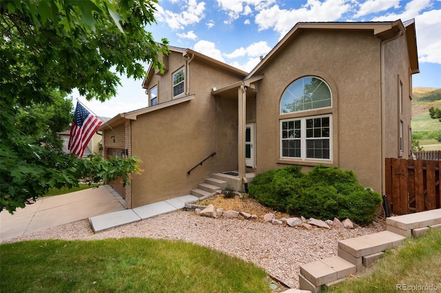 2859 Front Royal Dr, Colorado Springs, CO 80919 - view of front of house with stucco siding