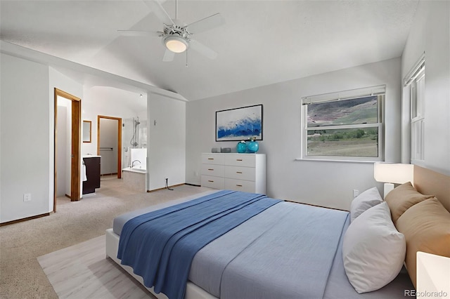 2859 Front Royal Dr, Colorado Springs, CO 80919 - bedroom featuring vaulted ceiling, light colored carpet, ceiling fan, and ensuite bath
