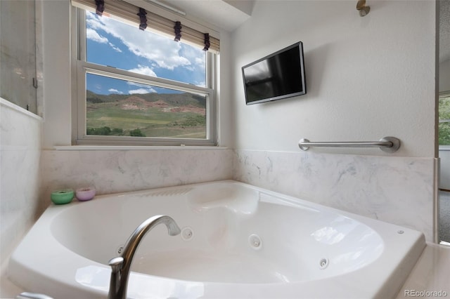 2859 Front Royal Dr, Colorado Springs, CO 80919 - bathroom with a whirlpool tub