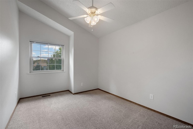 2859 Front Royal Dr, Colorado Springs, CO 80919 - empty room with carpet flooring, a ceiling fan, lofted ceiling, and a textured ceiling