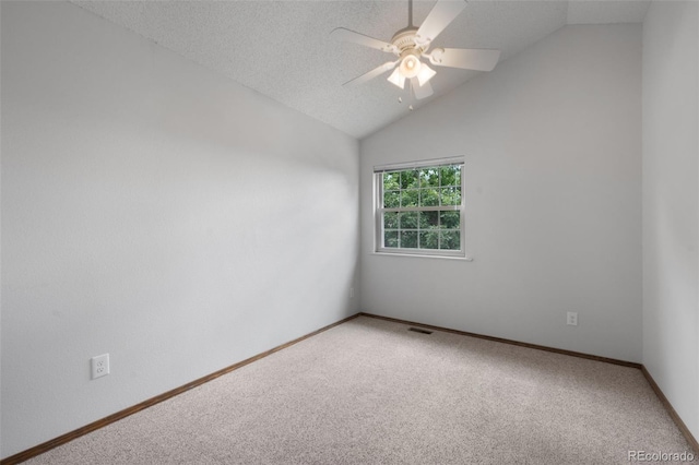 2859 Front Royal Dr, Colorado Springs, CO 80919 - carpeted empty room with a ceiling fan, vaulted ceiling, and a textured ceiling