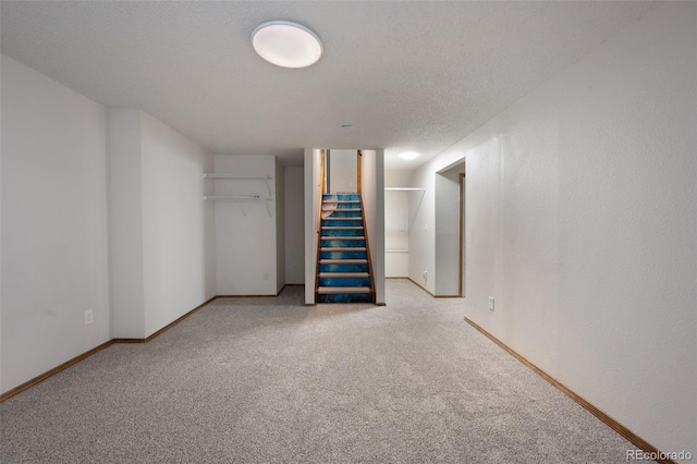 2859 Front Royal Dr, Colorado Springs, CO 80919 - finished below grade area featuring light colored carpet and stairs