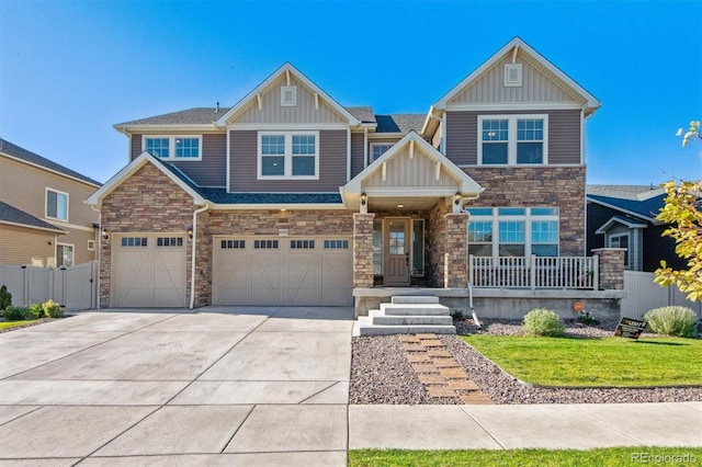 craftsman-style house with a front yard and a garage