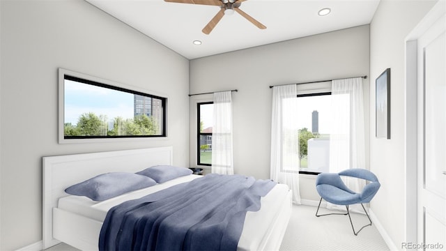 carpeted bedroom with ceiling fan